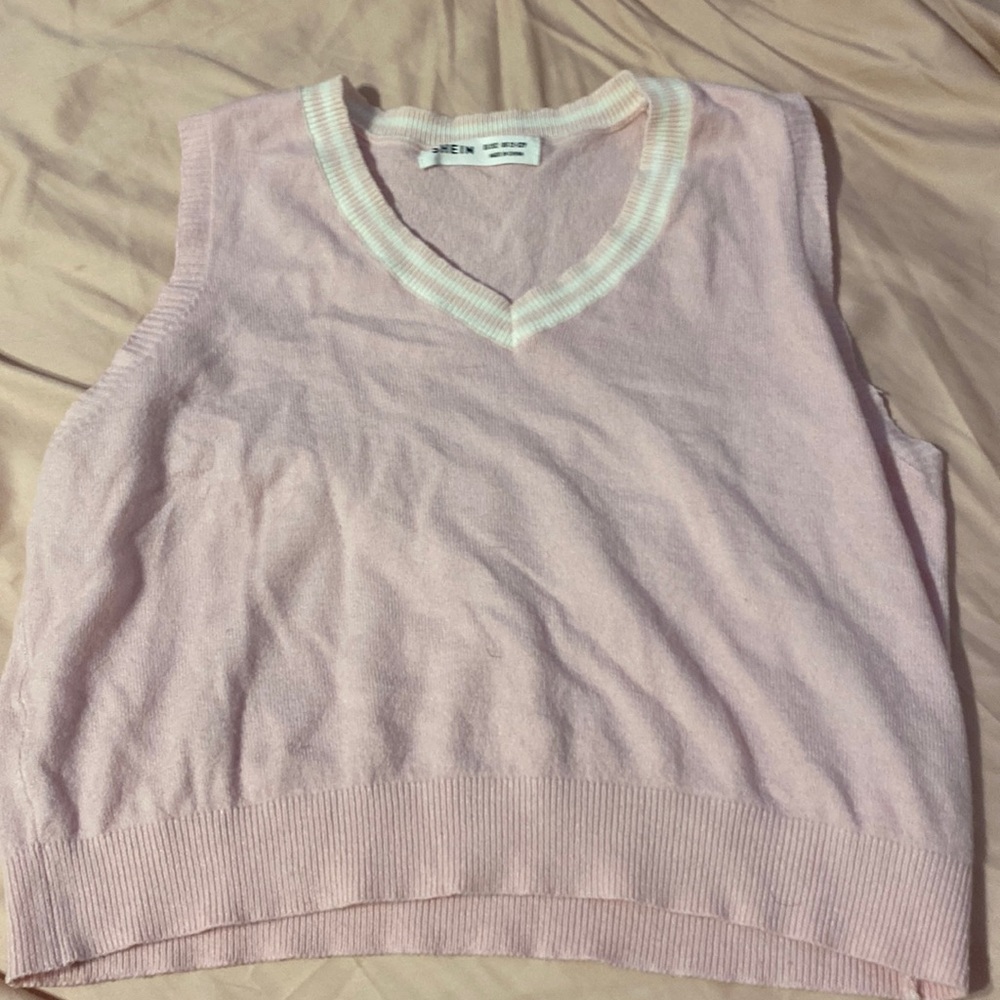 Pink vest sweater sort thing. Preppy top thing with stripes. 11-12 Girls preppy